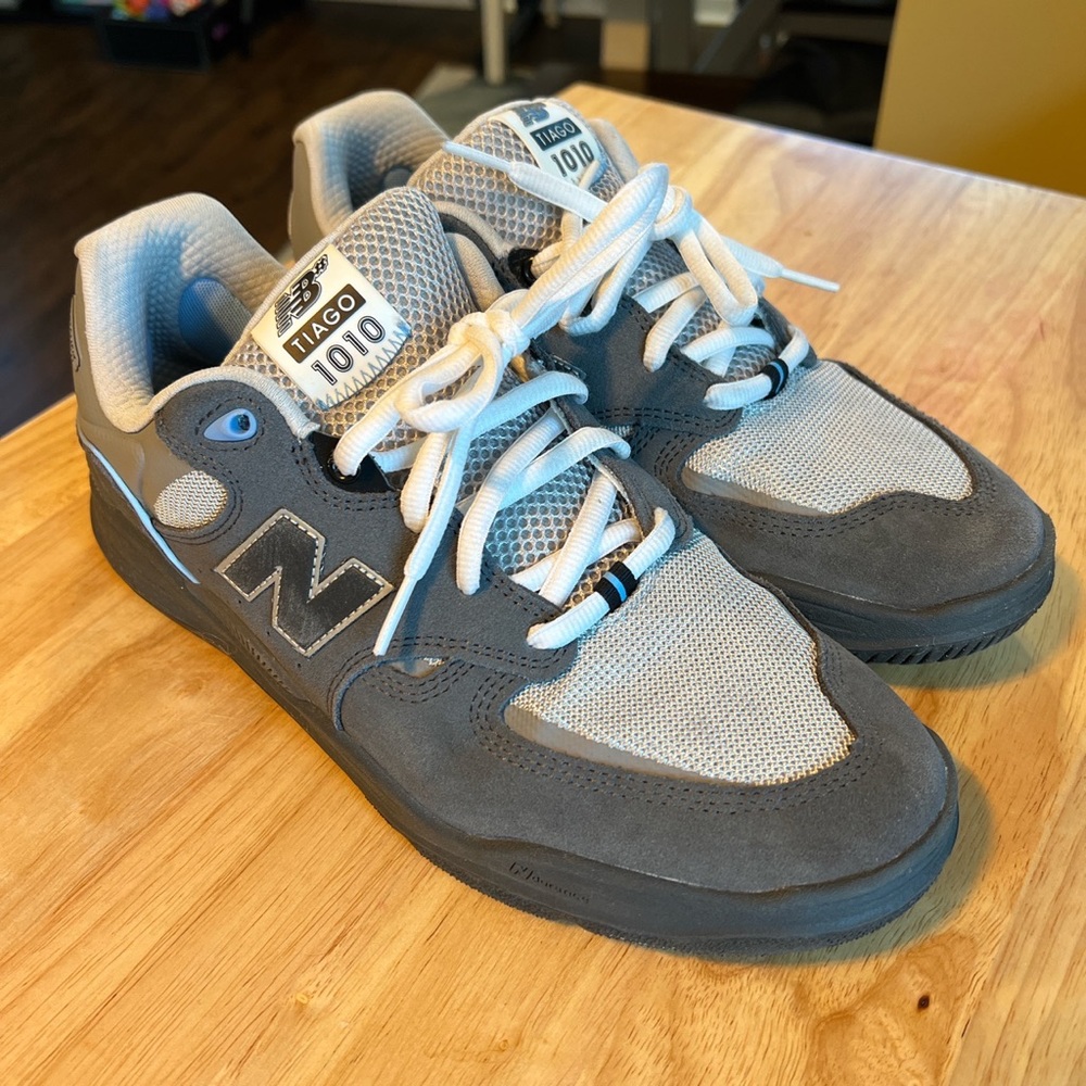Size 10.5 New Balance Tiago 1010s. Will clean shoe and sole before shipment.
